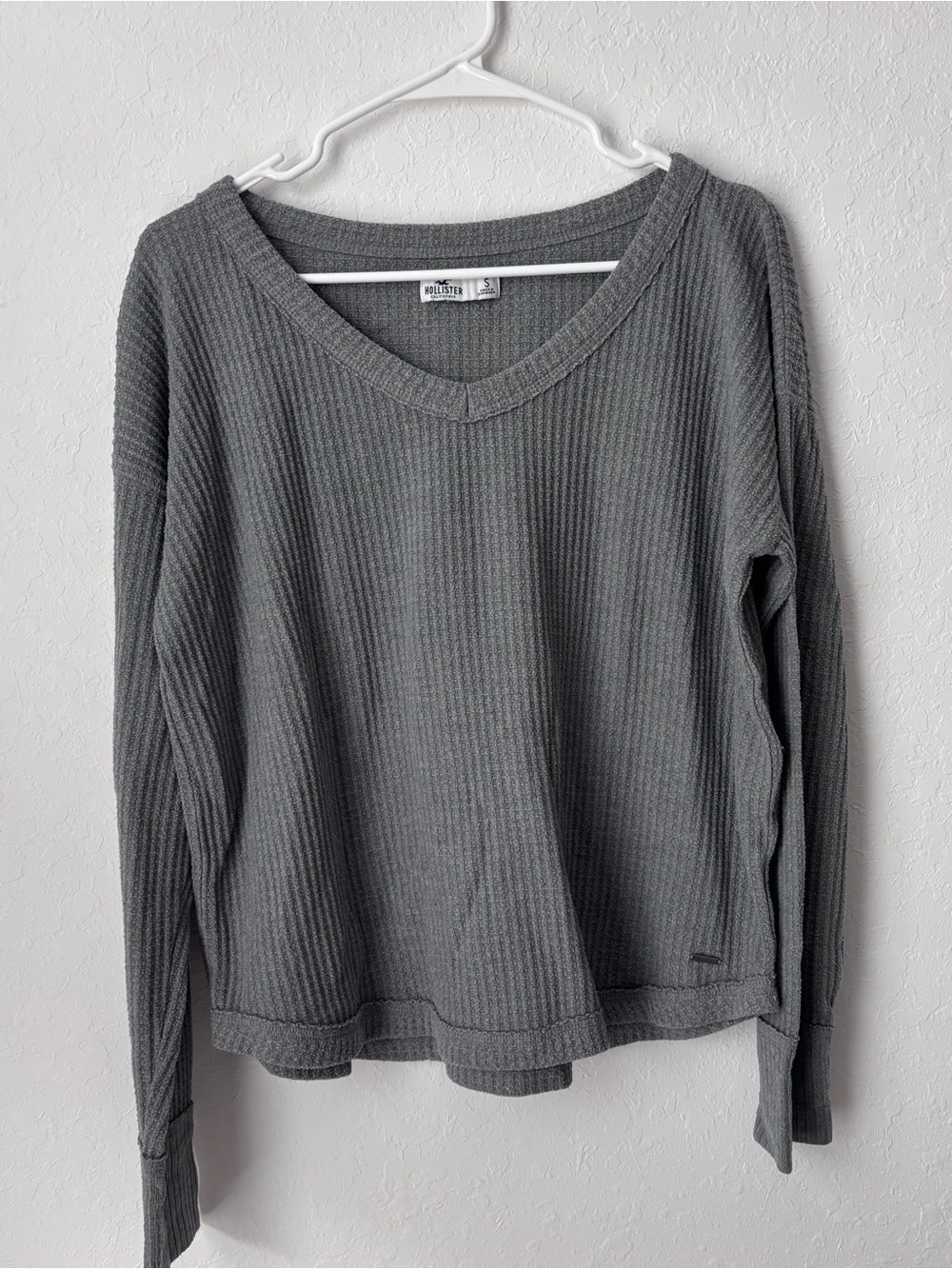 Hollister Women's Charcoal Gray Waffle V-Neck Long Sleeve atop